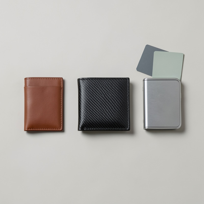 Minimalist wallet materials: leather, carbon fiber, and metal